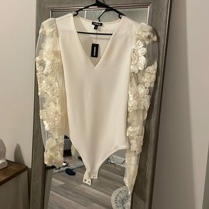 Express long sleeve body suit, crème color